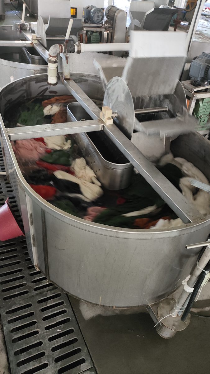 Industrial washing machine in action